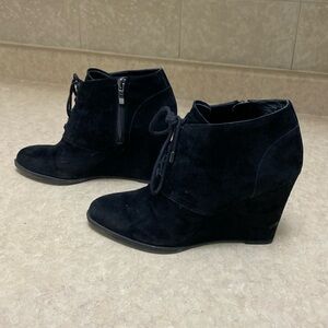 Franco Sarto suede bootie in black. Zippered side. Wedge heel